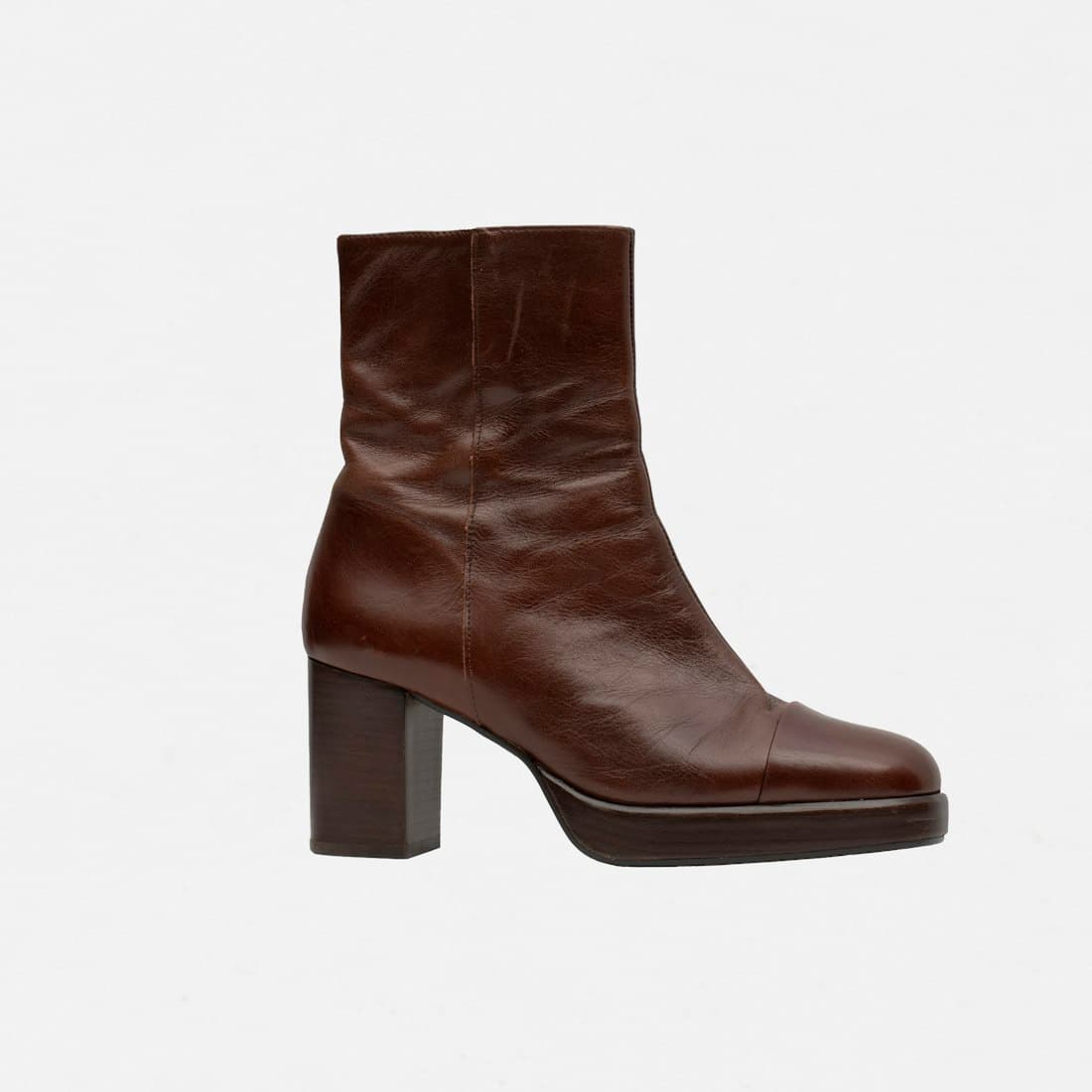 a black boot with a white background