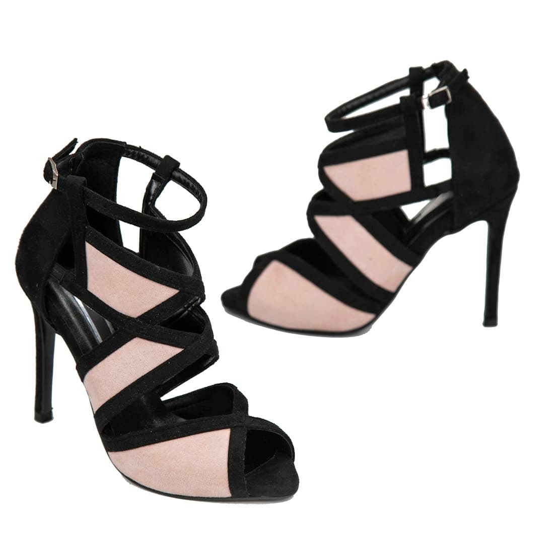 Two black and beige strappy high heel sandals on a white background