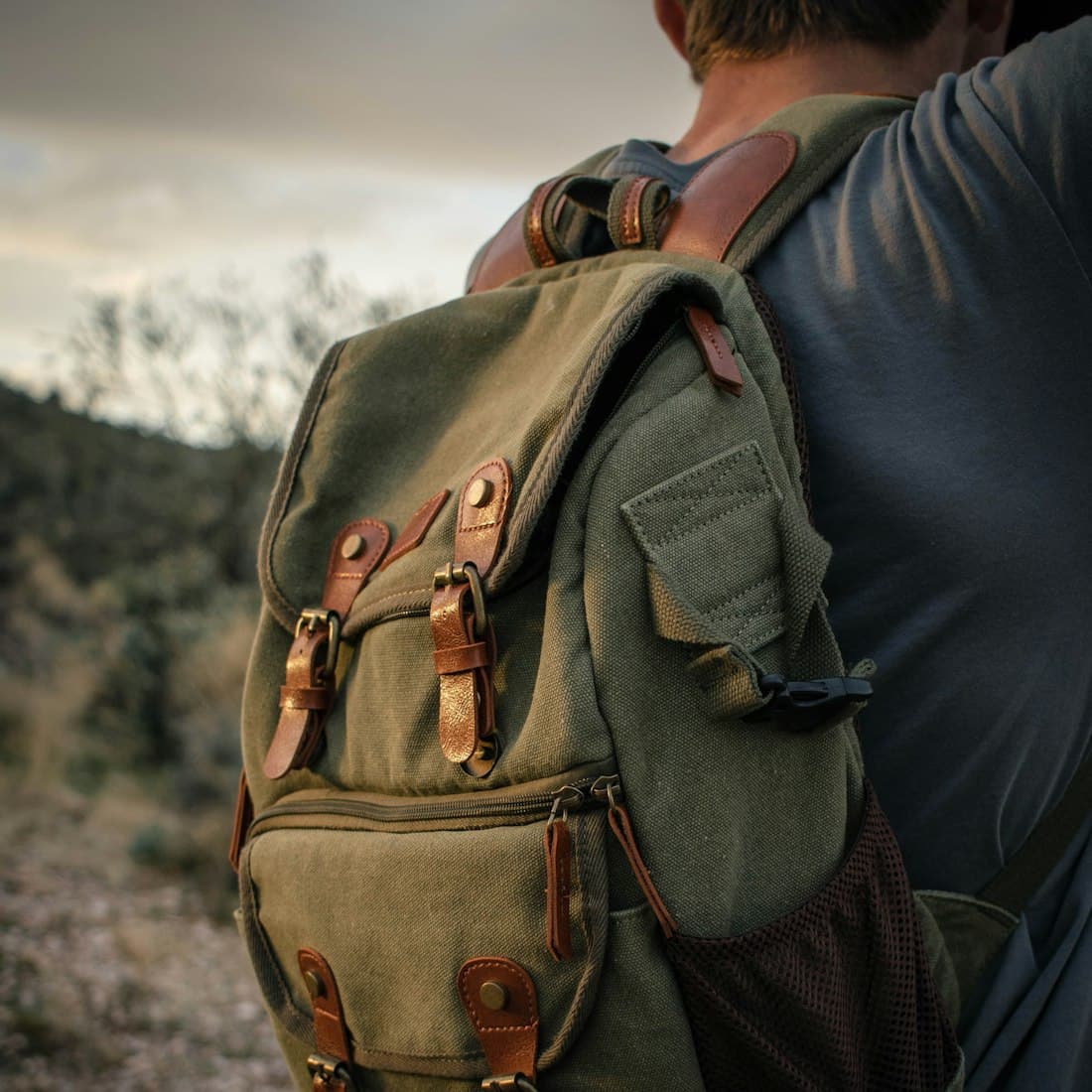 brown backpack on black textile